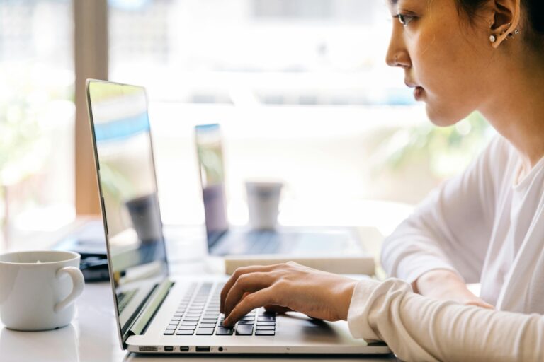 Person learning SEO and digital marketing on laptop