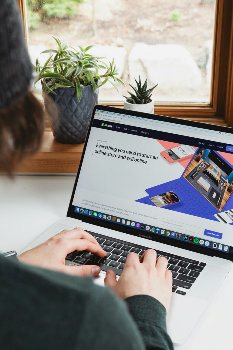 Business owner working on a website for online business growth